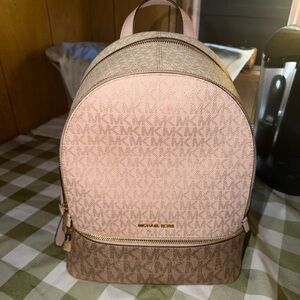 Like new michael kors backpack